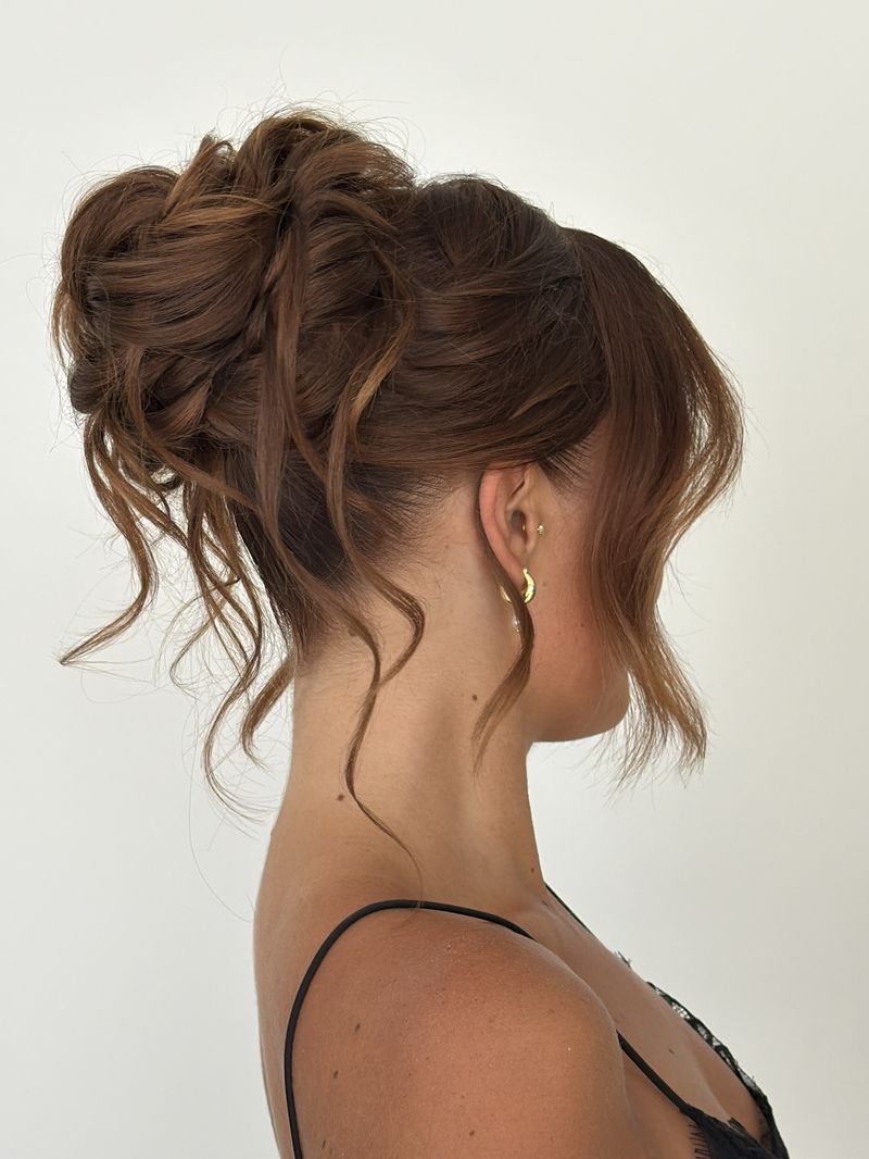 Romantic auburn updo with face-framing waves