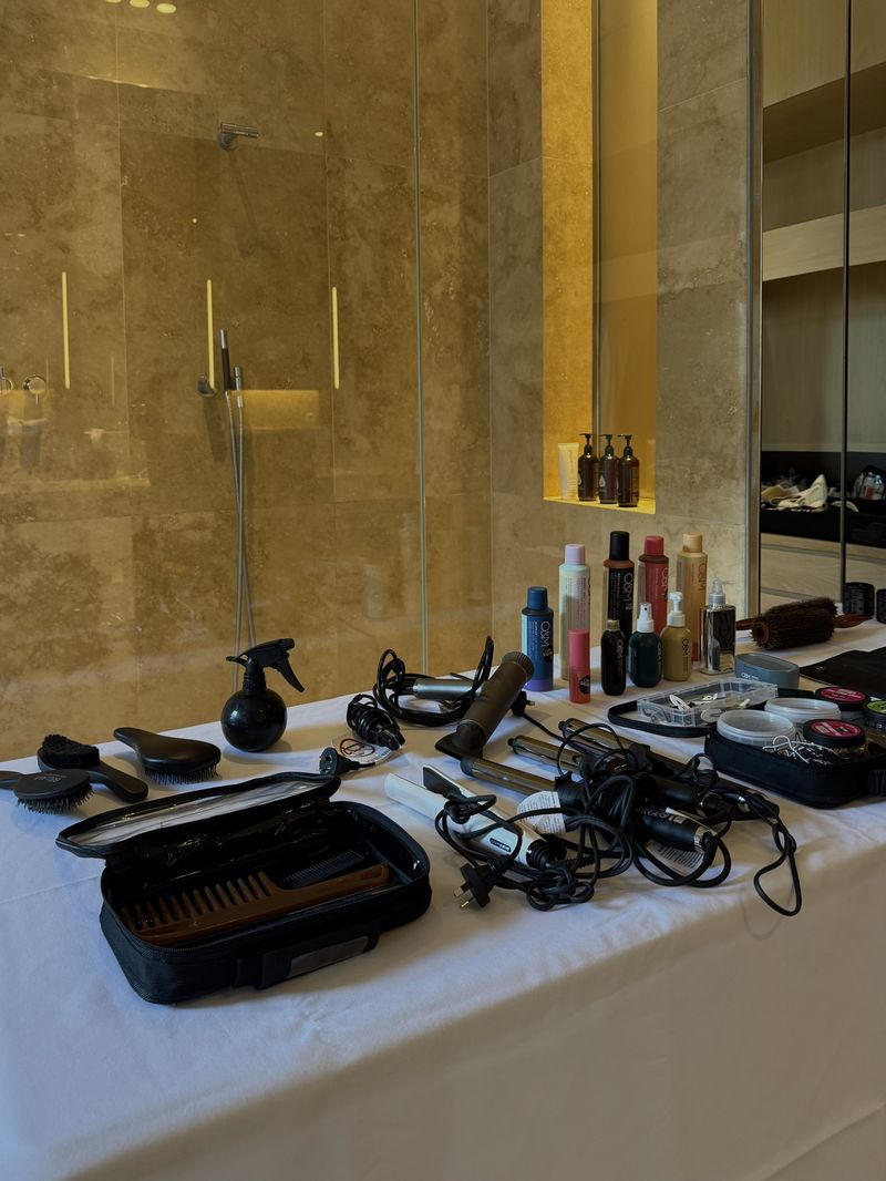 O&M products and styling tools set out on a wedding morning